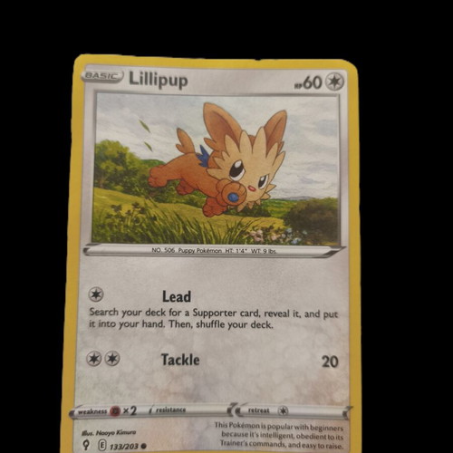 Pokemon trading card collection with Smeargle, Silvally, Pawniard, Zangoose, Lillipup, Metagross