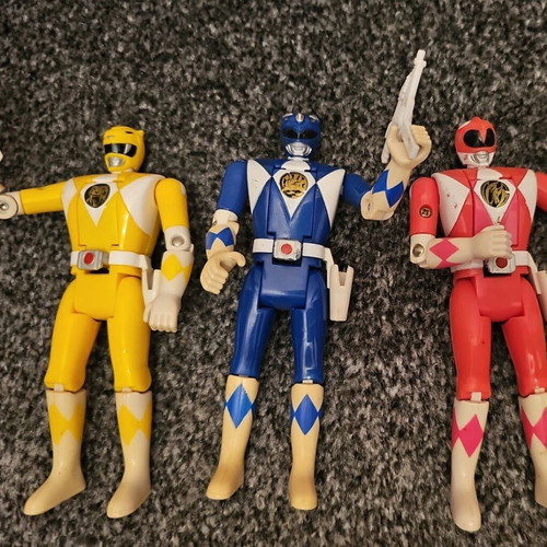 Power Rangers flip head figures used with 3 weapons