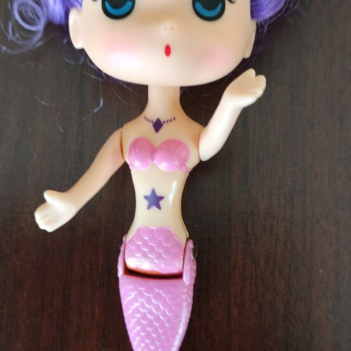 Dolls used, two regular and two mermaid dolls