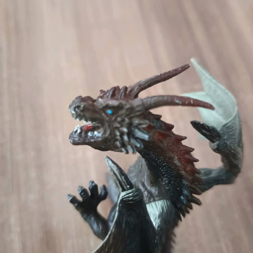Dragon used, 11cm tall, missing finger on right hand