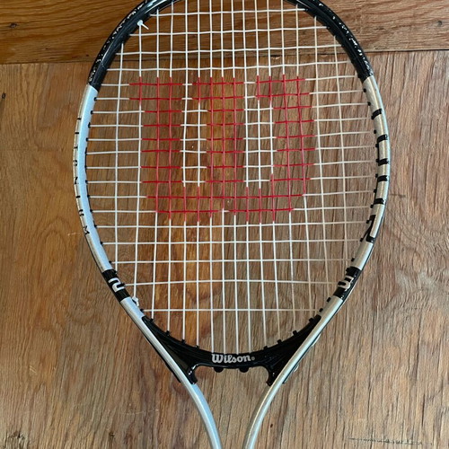 Wilson tennis racket used with minor wear