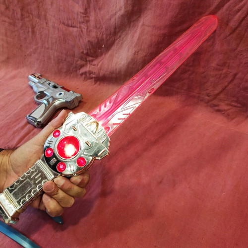 Toys used, space gun and swords with batteries
