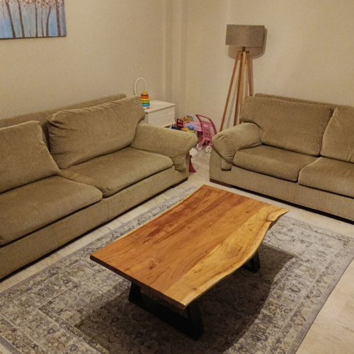 Living room set with coffee table and sofas used