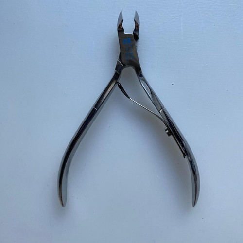 Manicure and cuticle nippers used, various models including Credo Solingen