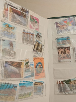 Stamp album with Greek stamps