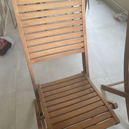 Wooden balcony table with four chairs used