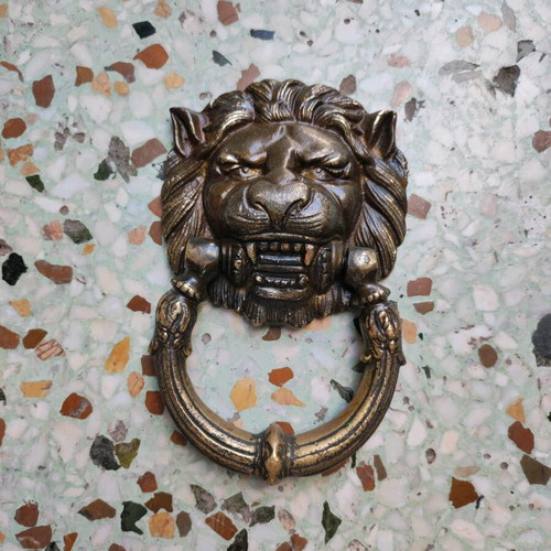 Bronze door knocker like new with lion face for solid door