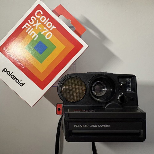 Polaroid Sonar AF 5000 instant camera with 8-frame film pack