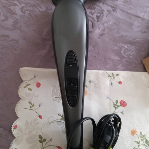 Massage device used with two heads