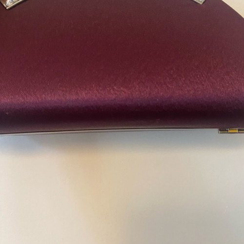 Evening handbag with extra chain for crossbody wear