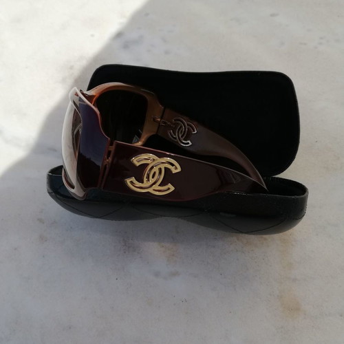 Chanel sunglasses with their case