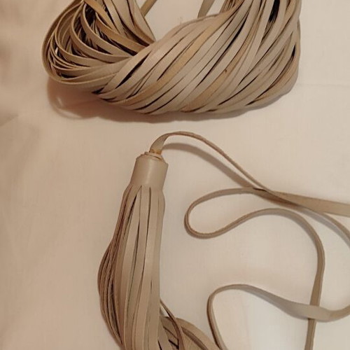 Necklace and bracelet set with leather tassels, beige nude