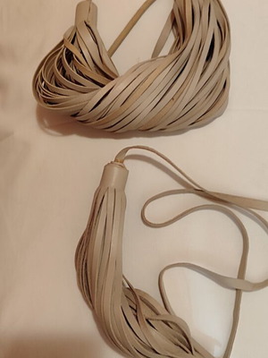 Necklace and bracelet set with leather tassels, beige nude
