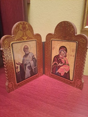 Wooden religious diptych with Virgin Mary and Saint John the Theologian used