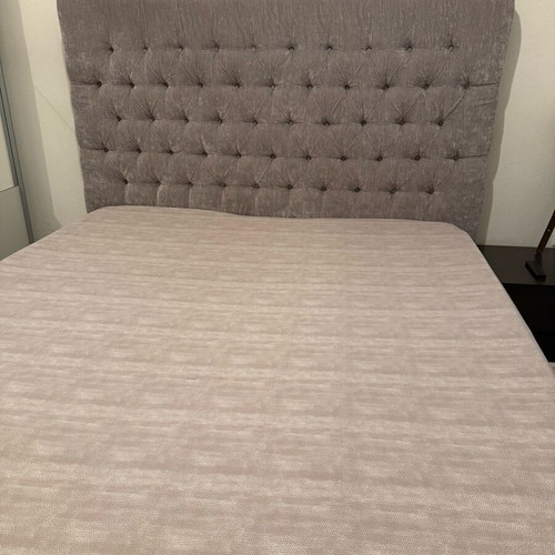 Double bed with water-repellent grey beige fabric and mattress like new