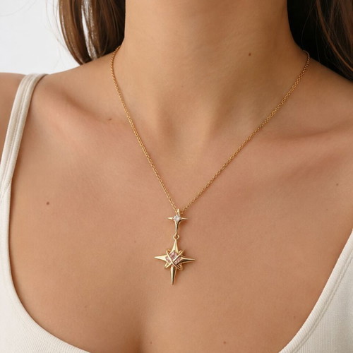 North Star gold necklace with star and pink crystals