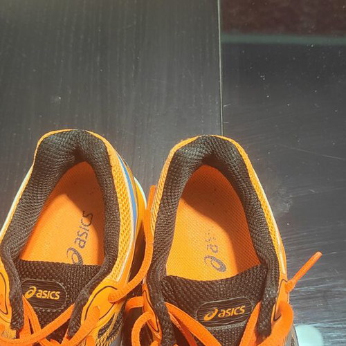 Asics Cumulus 17 running shoes, size 38, black and orange