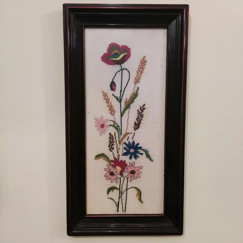 Decorative textile painting with handmade embroidery used, flowers