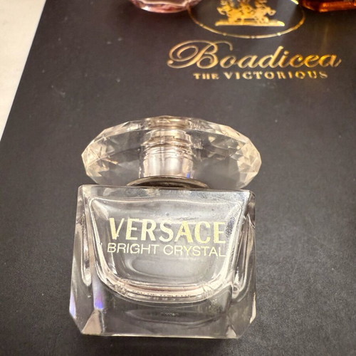 Collection of 11 authentic miniature perfumes like new