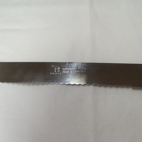 Okapi vintage bread knife 100% authentic like new, made in Germany
