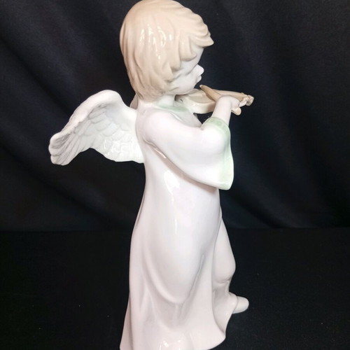 Porcelain angel figurine playing violin