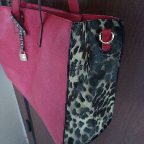 Bag red with tiger print on side like new, large capacity