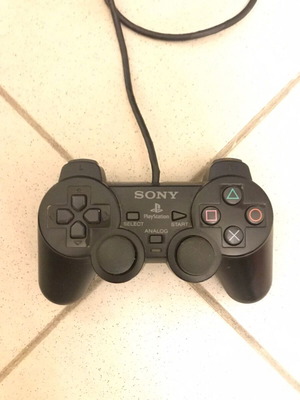 PlayStation 2 controller used, needs cable repair