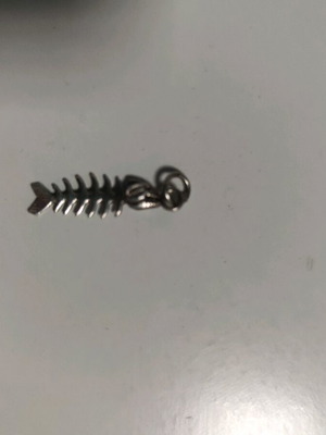 Silver fishbone pendant used