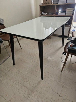 Glass dining table, white top with black legs