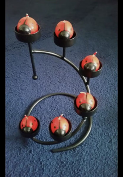 Vintage black metal candle holder for 6 candles.