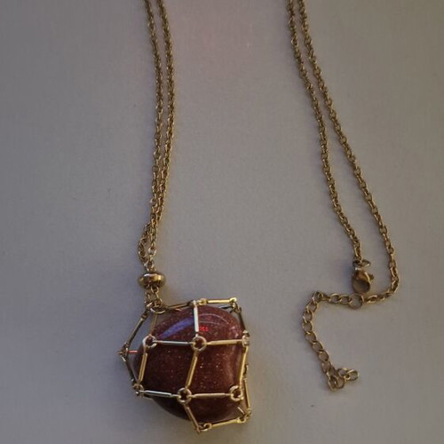Necklace with goldstone heart