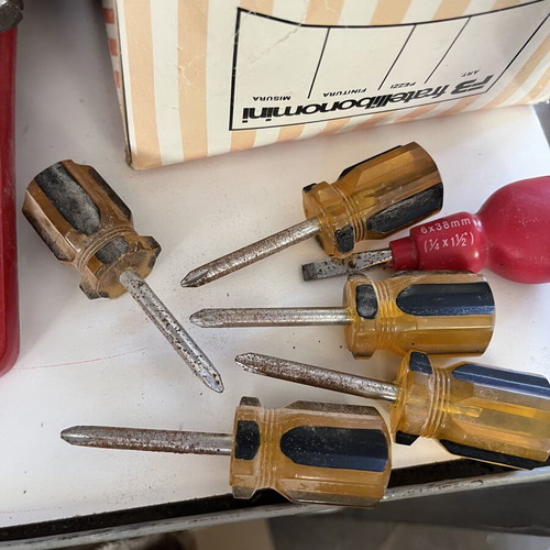 Mini screwdrivers used, small worn set