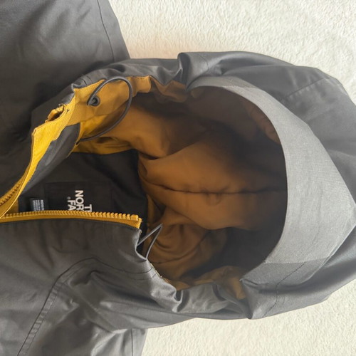 The North Face Millerton jacket like new, windproof, waterproof, black and gold