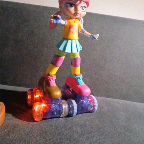 Rainbow Riley remote control doll like new