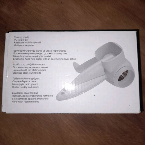 Hand-held grater new with plastic casing and inox wheel