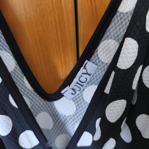 Juicy one-piece jumpsuit like new, sleeveless wrap, black-white