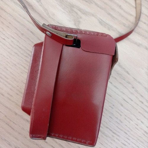 Lubitel 2 camera used with brown leather case
