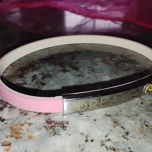 Rubber bracelet pink new with metal dream decoration