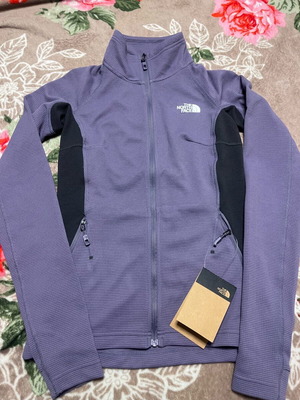 The North Face purple jacket brand new, size XS