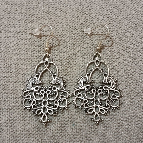 Set of six pairs of earrings new, three dangling and three small