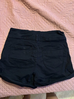 Shorts used, black, size approximately medium/small