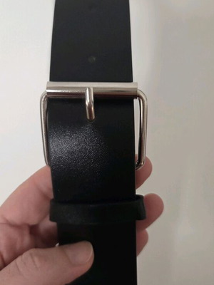 Nina Kendosa belt simple black like new, unworn