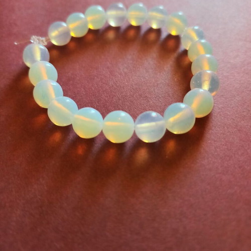 White bracelet with opal beads new