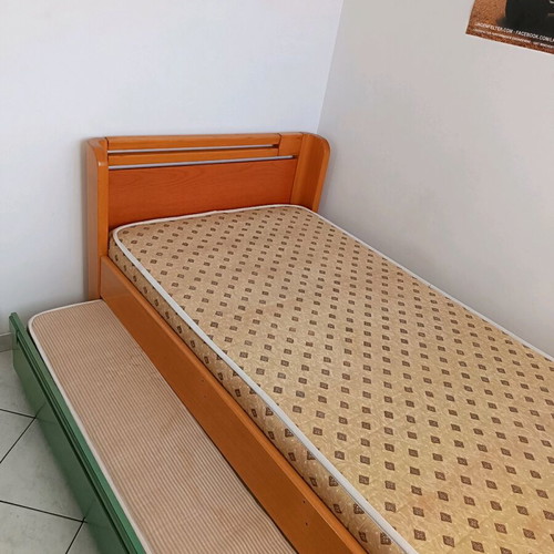 Single bed with used sliding bed and metal frame