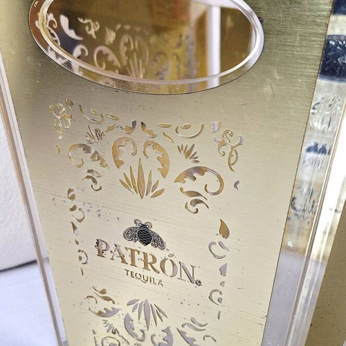 Patron champagne bucket like new with 4 empty silver bottles