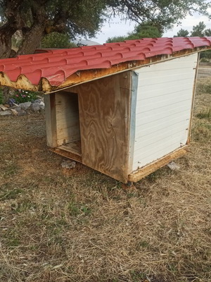Custom handmade dog house from panels