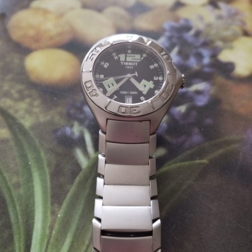 Tissot men's wristwatch like new, silver with sapphire crystal