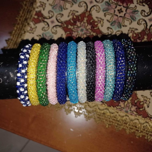 Bracelets new, set of 4 in various colors