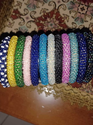 Bracelets new, set of 4 in various colors