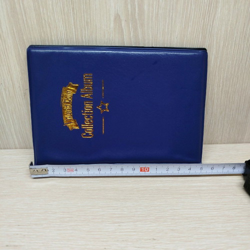 Coin collection album new, blue leatherette with 120 slots